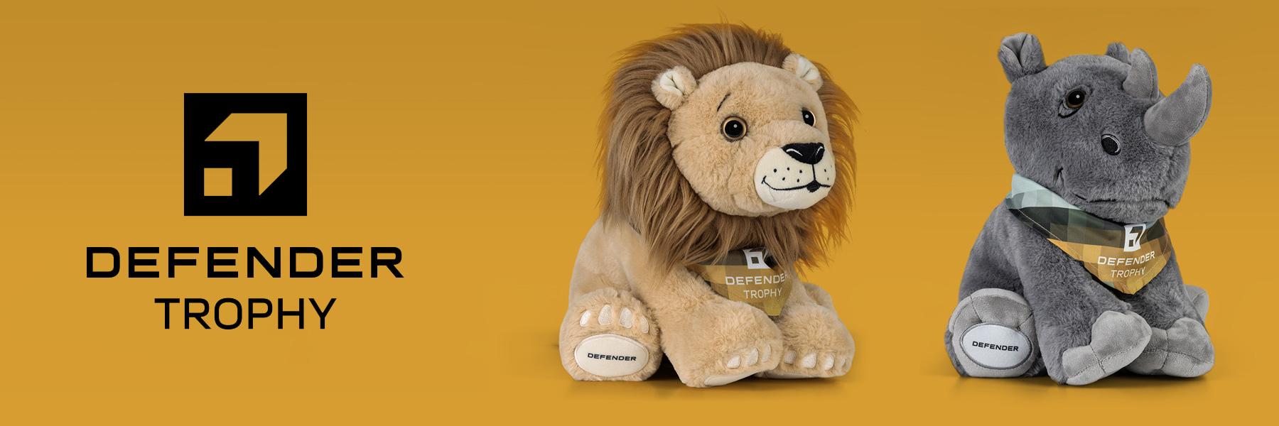 Defender x Tusk - Category Banner Banner principal de Defender Trophy con nuestros osos de peluche Tusk de león y rinoceronte.